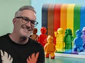 Designer and vice president of design for Lego, Matthew Ashton, with the company's new rainbow-themed 'Everyone is Awesome' set (Photo: LEGO/PA Media)