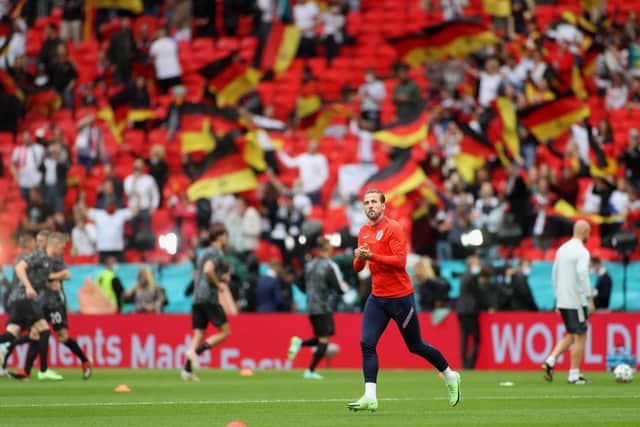 Harry Kane of England applauds the fans as he takes to the field for the warm up prior to the UEFA Euro 2020 Championship Round of 16 match between England and Germany at Wembley Stadium on June 29, 2021 in London, England. (Photo by Carl Recine - Pool/Getty Images)