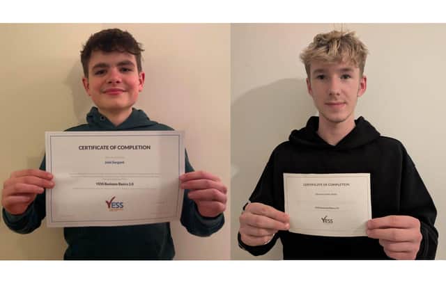 Josh (left) and Edward (right) with their YESS certificates.