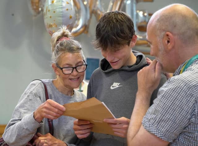 A student at the Fowey River Academy receives his GCSE results (Photo: Hugh Hastings/Getty Images)