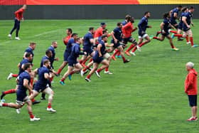 The Lions warm up during the British and Irish Lions captain's run at Emirates Airline Park. The squad has been hit by Covid.