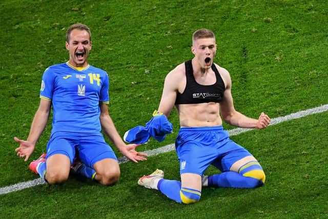 Artem Dovbyk of Ukraine celebrated with his team mate, Yevhen Makarenko after scoring their side's winning goal  (Picture: Getty Images)