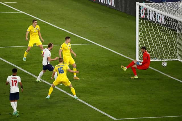 England captain Harry Kane scores in the 4-0 quarter-final win over Ukraine.