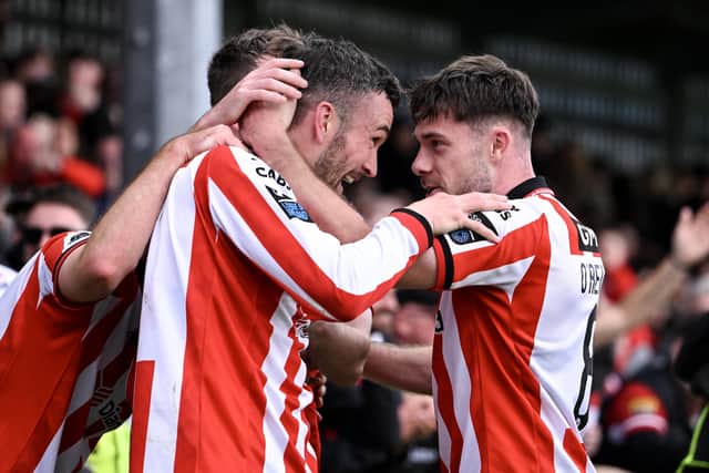 GOOD TIMES . . . Skipper Michael Duffy celebrates with team-mate Adam O'Reilly.  Photo by Stephen McCarthy/Sportsfile