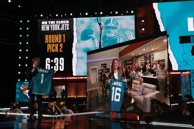 NFL Commissioner Roger Goodell announces the Jacksonville Jaguars selection of Trevor Lawrence with the first pick of the 2021 NFL Draft at the Great Lakes Science Center on April 29, 2021 in Cleveland, Ohio.