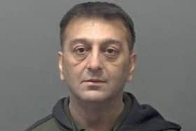 Jawaid Murtaza, aged 56, pleaded guilty to two charges

