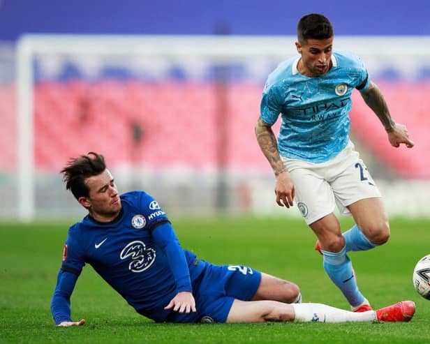 Ben Chilwell of Chelsea and Joao Cancelo of Manchester City  battle for the ball  during the Semi Final of the Emirates FA Cup match at Wembley Stadium on April 17, 2021 (Photo by Ian Walton - Pool/Getty Images)