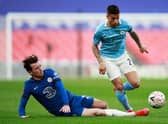 Ben Chilwell of Chelsea and Joao Cancelo of Manchester City  battle for the ball  during the Semi Final of the Emirates FA Cup match at Wembley Stadium on April 17, 2021 (Photo by Ian Walton - Pool/Getty Images)