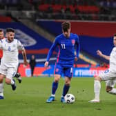 Mason Mount of England is challenged by Adolfo Hirsch of San Marino during the FIFA World Cup 2022 qualifying match.