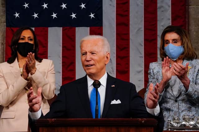 US President Joe Biden addresses a joint session of Congress as Vice President Kamala Harris (L) and Speaker of the House Nancy Pelosi (R) look on in the House chamber of the US Capitol in Washington DC. (Pic: Getty Images)