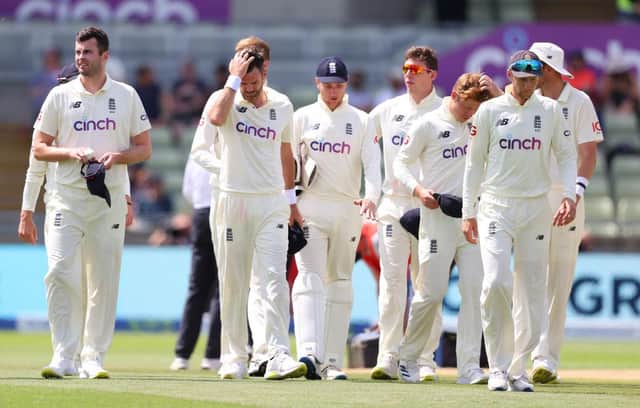 Dejected England players led by Joe Root make their way off the field following defeat against New Zealand at Edgbaston on June 13, 2021 in Birmingham, England. (Photo by Michael Steele/Getty Images)