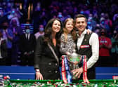 England's Mark Selby posses with his wife and daughter after winning the the Betfred World Snooker Championships 2021 at The Crucible, Sheffield.