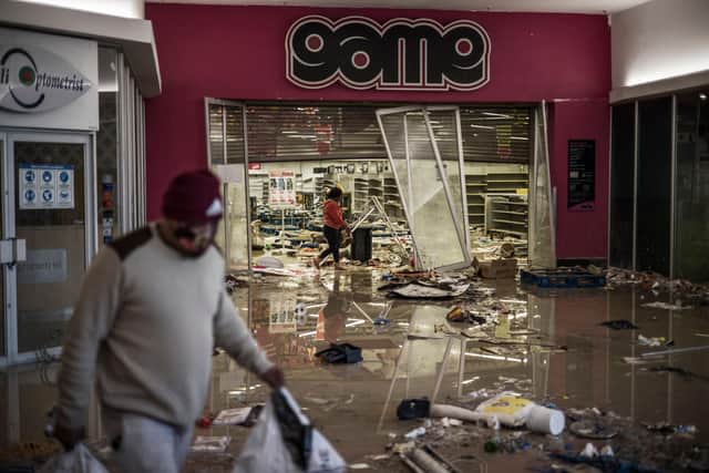 A mall in Vosloorus is left vandalised after raging unrest erupted when former president Jacob Zuma started serving a 15-month term for contempt  (AFP/Getty Images)
