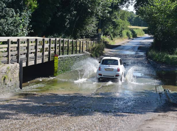 <p>DECEMBER -- the Rufford Mill Ford was closed to motorists after it became an unlikely tourist attraction with drivers splashing through the water in front of large crowds.</p>