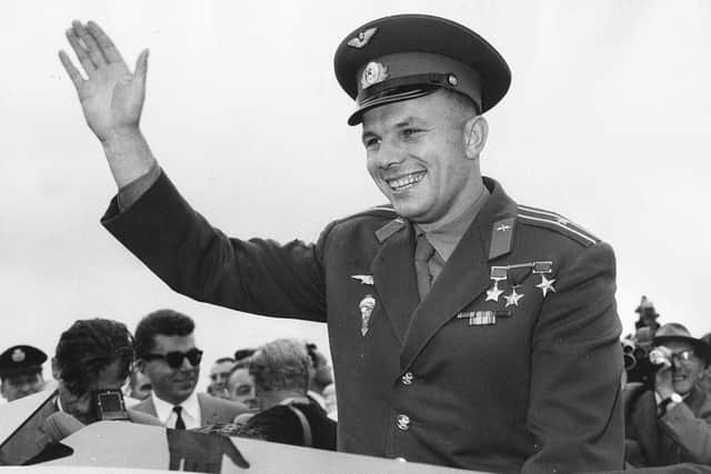Gagarin - pictured here waving to crowds in London - toured the UK three months after the mission (Photo: Terry Disney/Central Press/Getty Images)
