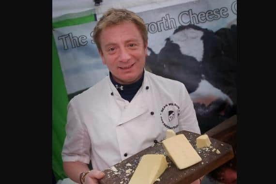 Sean Wilson, aka Corrie's Martin Platt, with his cheese at a festival in 2011.