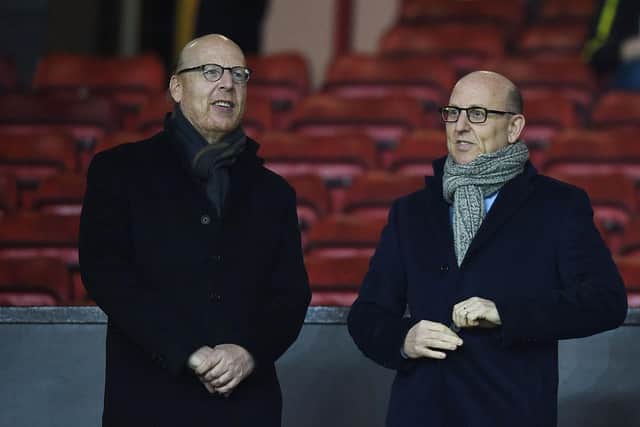 Avram Glazer (L) and Joel Glazer, the Co-Chairmen of Manchester United whose tenure in charge of the club has been increasingly unpopular.