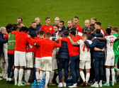 Gareth Southgate, Head Coach of England, speaks with his players. (Photo by John Sibley - Pool/Getty Images)