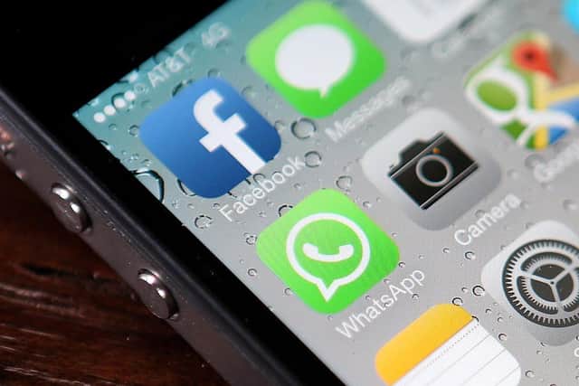 WhatsApp users have been targeted with a range of new scams, including some whereby users are re-directed to a false Facebook login page (Picture: Getty Images)