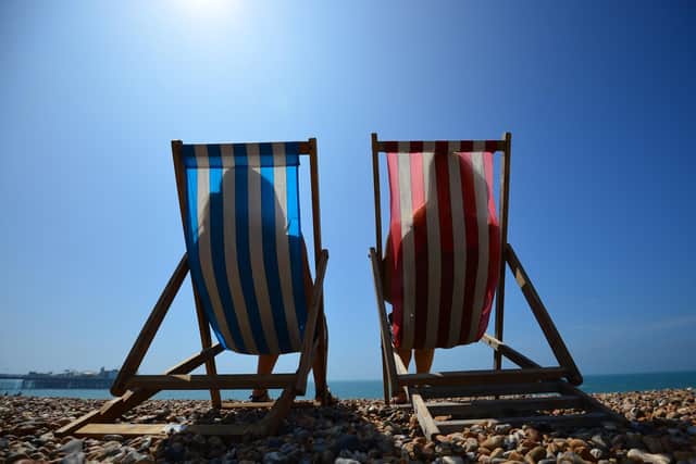 Sunworshippers should think about buying suncream aplenty as temperatures are set to stay warm throughout June and into July (AFP/Getty)